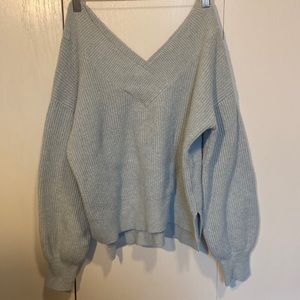 light blue sweater